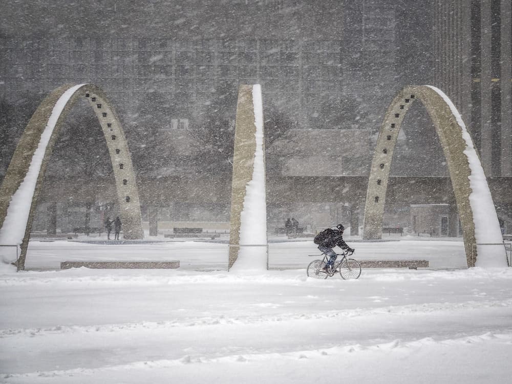 Snowy Urban Ride by Richard Huang — canvas wall art
