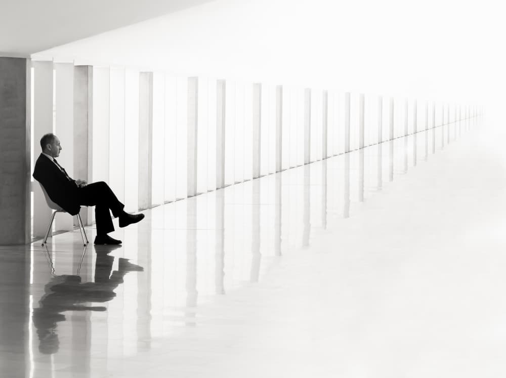 Man in Bright Corridor by Tomer Eliash — canvas wall art