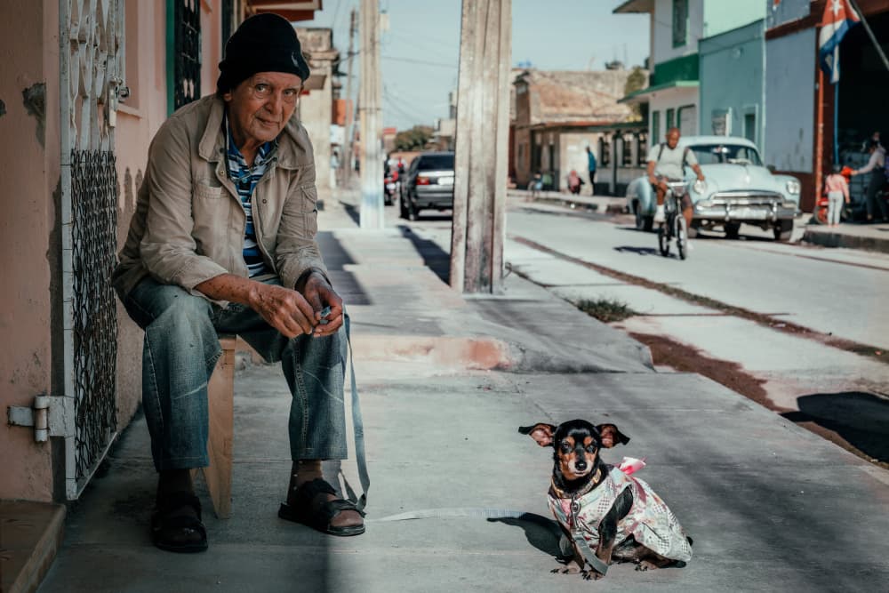 Cuban Man And His Dog by Andy Bauer — canvas wall art