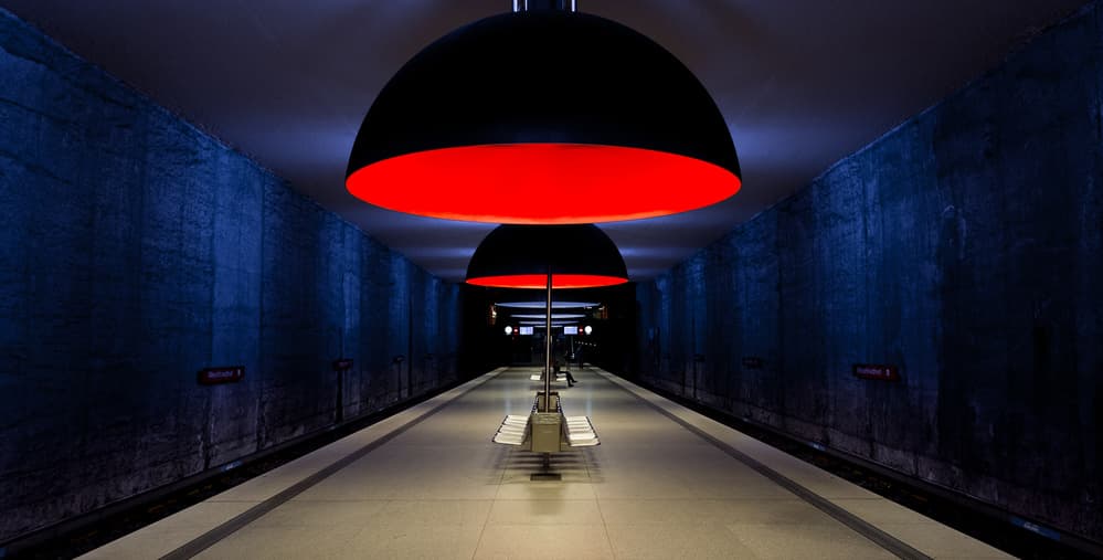 Red Lit Subway Station by Marc Pelissier — canvas wall art