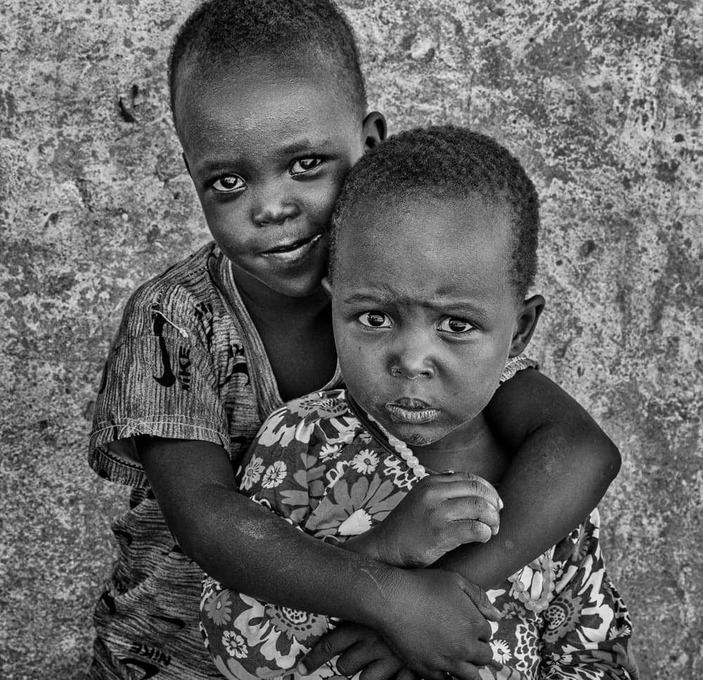 Children's Warm Embrace by Joxe Inazio Kuesta Garmendia — canvas wall art