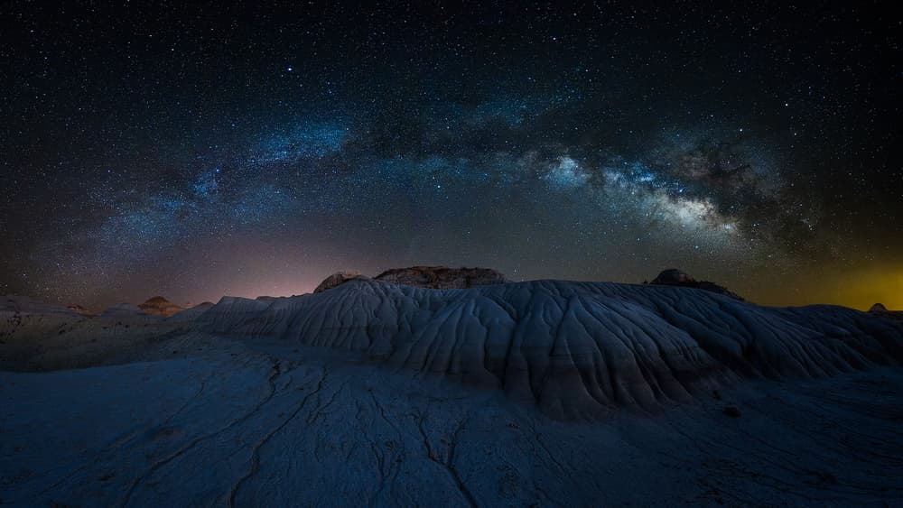 Milky Way Over Badlands by Jason Ma — canvas wall art