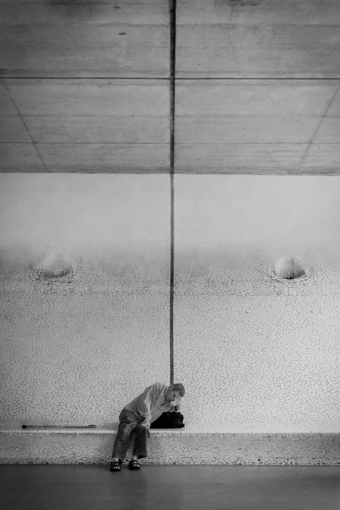 Contemplative Urban Figure by Fernando Coelho — canvas wall art