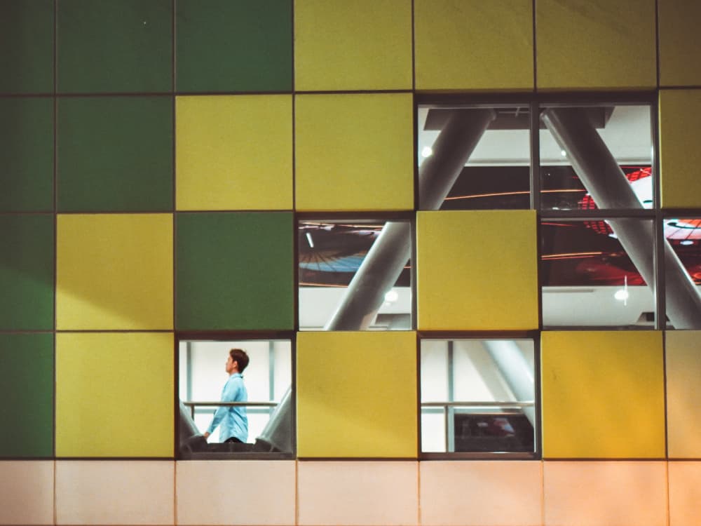 Man in Geometric Grid by Yi-Tang Wang — canvas wall art