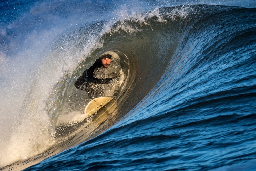 Surfer In A Golden Barrel by David Wang — canvas wall art