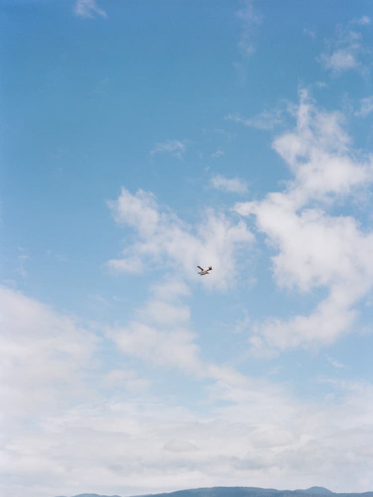 Small Plane Blue Sky by Bethany Young — canvas wall art
