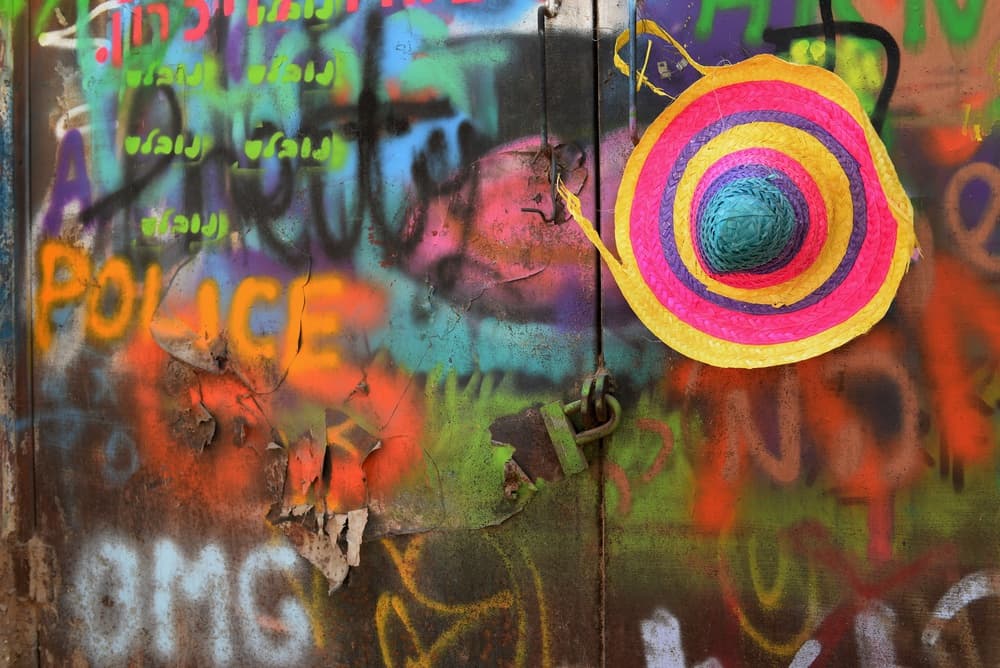 Vibrant Street Art Hat by Izak Katz — canvas wall art