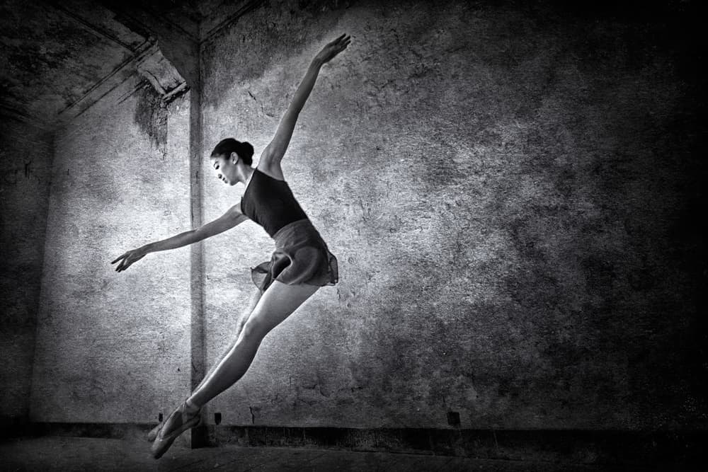 Graceful Ballerina Leap by Arief Siswandhono — canvas wall art