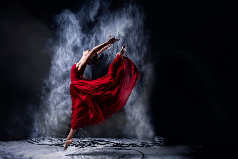 Red Dress Dance Leap by Petr Kleiner — canvas wall art