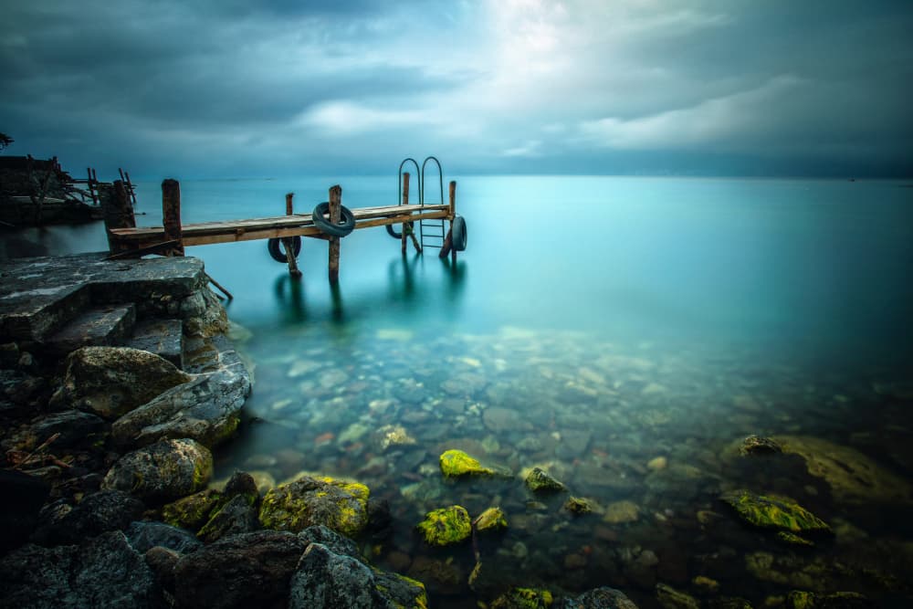 Moody Lake Dock by Edgar Monzon — canvas wall art