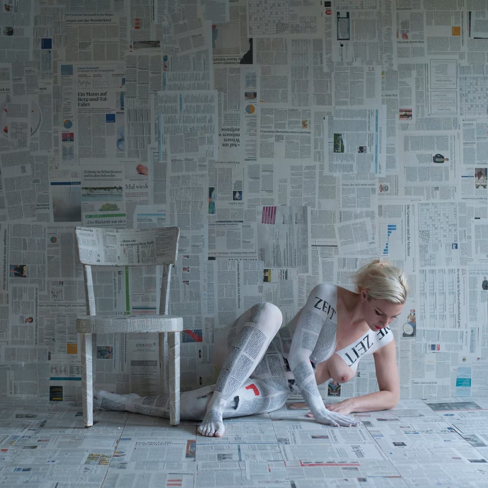 Woman in Newsprint by woodplane — canvas wall art