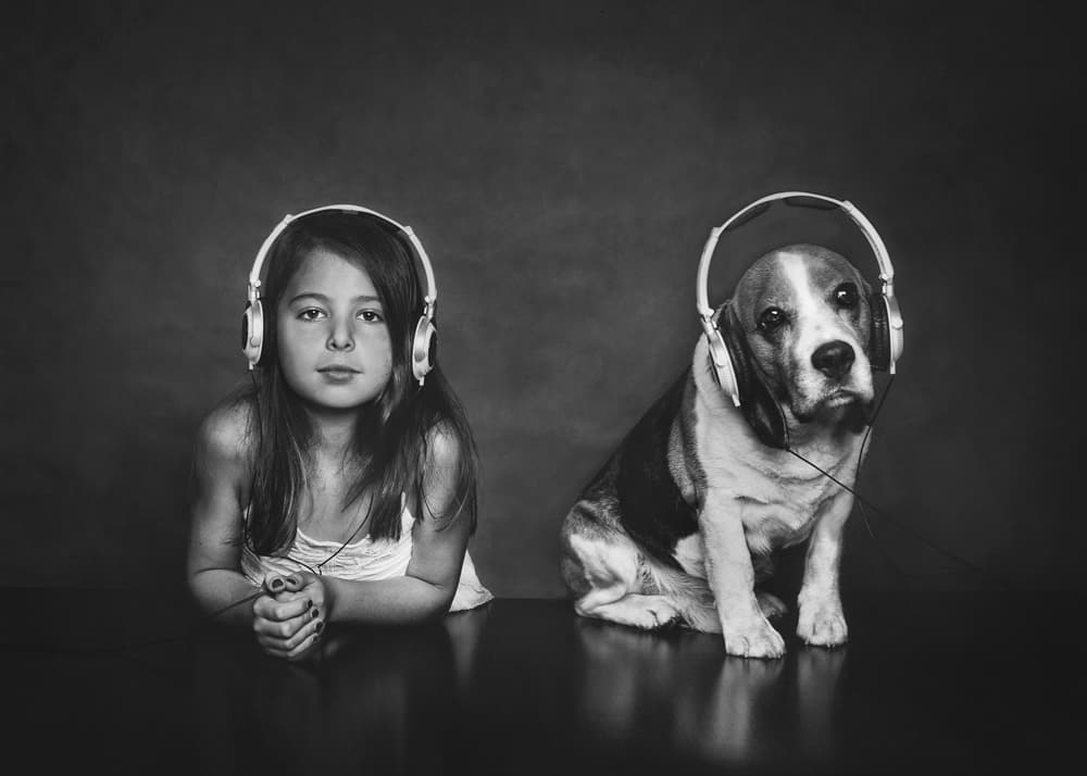 Girl and Dog Listen by Monique — canvas wall art