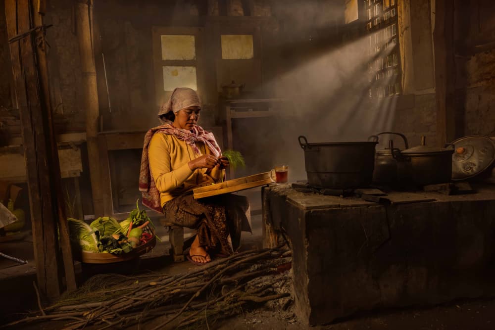 Woman In Rustic Kitchen by Agus Adriana — canvas wall art