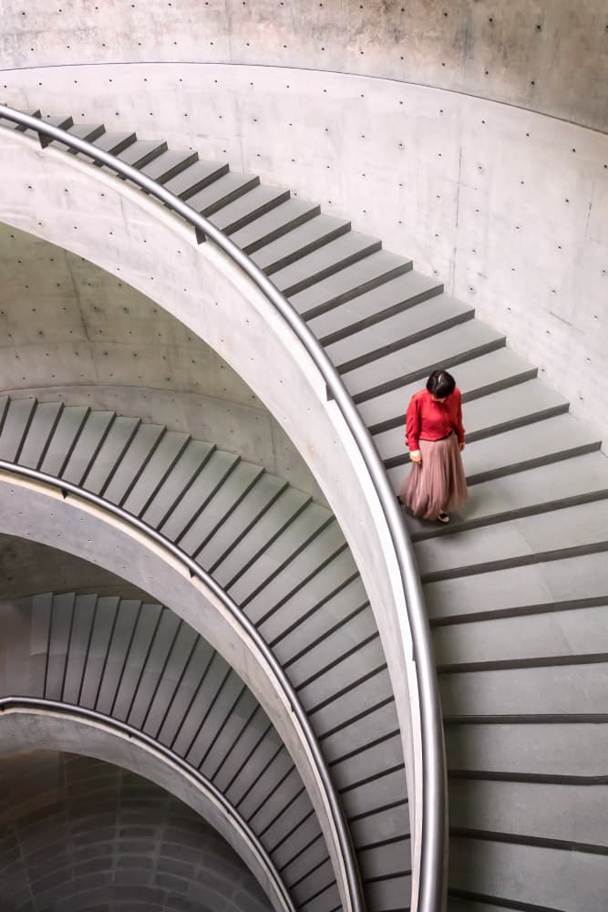 Woman On Spiral Staircase by Jiahong Zeng — canvas wall art