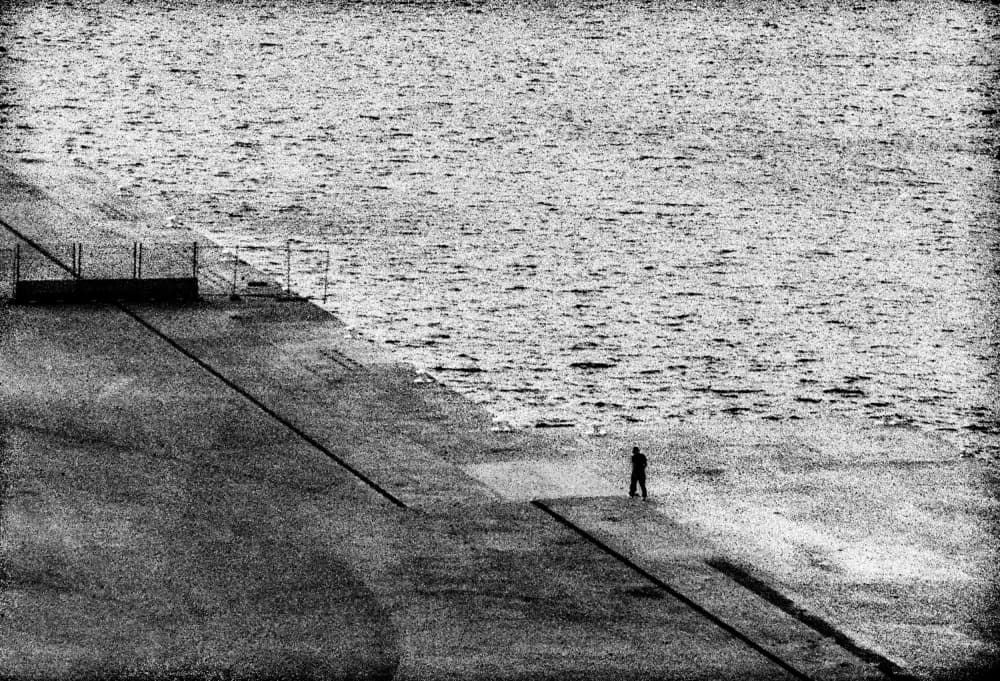 Man At Water's Edge by Paulo Abrantes — canvas wall art