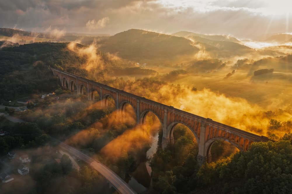 Misty Valley Bridge by Herbert Rong — canvas wall art