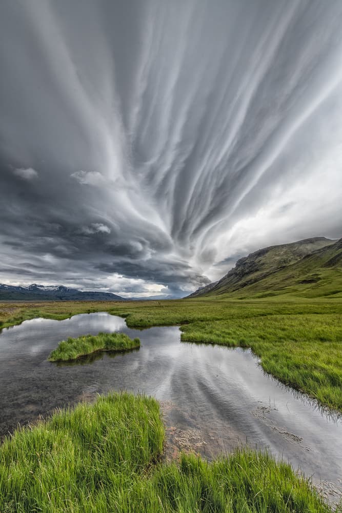 Swirling Clouds Valley River by Marc Pelissier — canvas wall art