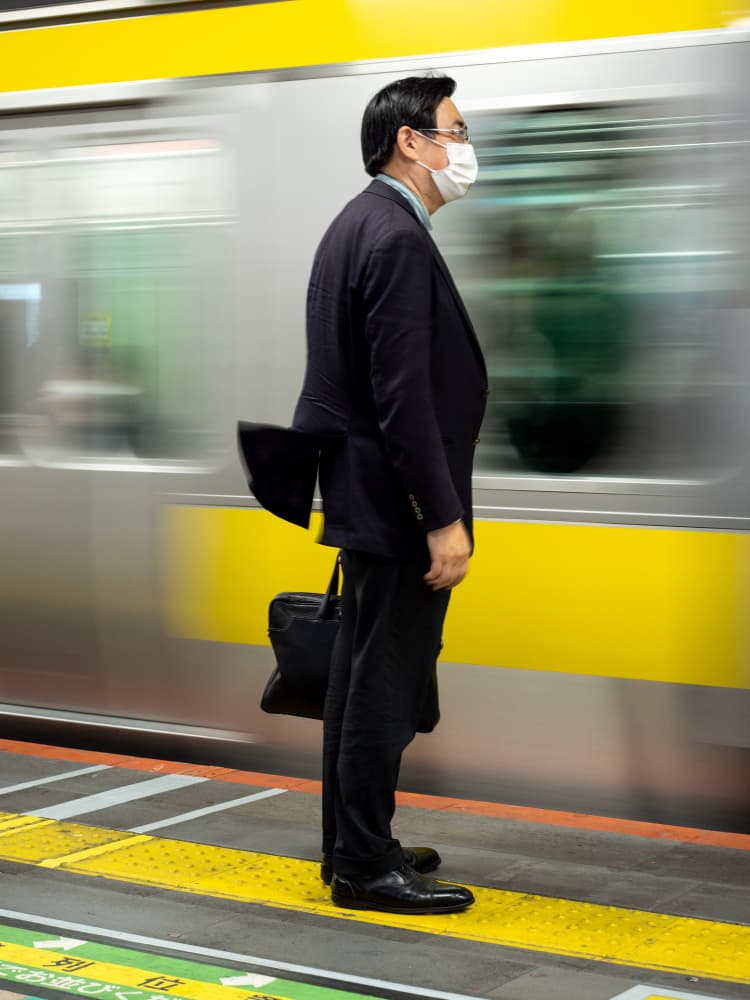 Commuter Awaits Train by Lorenzo Luca Andriani — canvas wall art