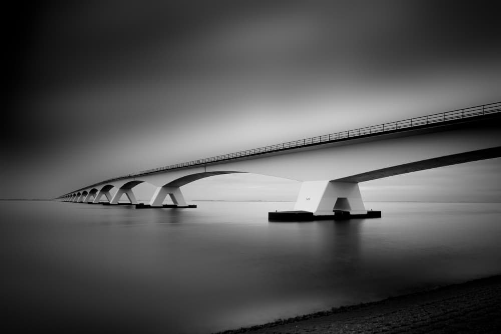 Long Bridge Calm Sea by Fred Louwen — canvas wall art