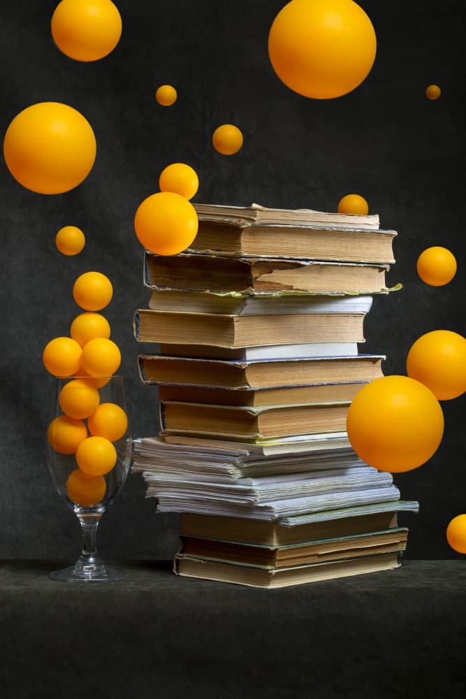 Books and Floating Orbs by Brig Barkow — canvas wall art