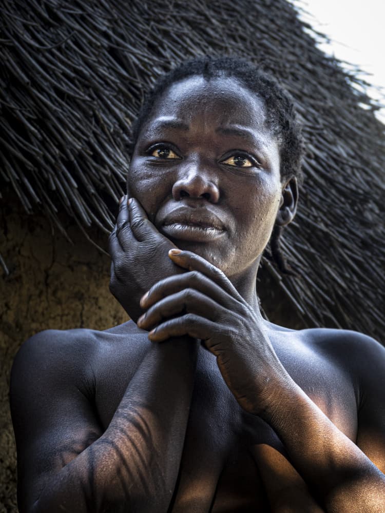 Thoughtful African Portrait by Elena Molina — canvas wall art