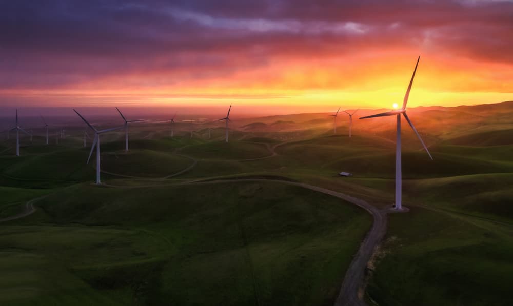 Vibrant Sunset Wind Turbines by Jenny Qiu — canvas wall art