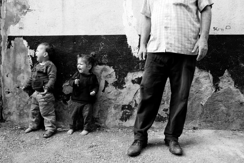 Crying Toddlers Urban Scene by Ali Ayer — canvas wall art