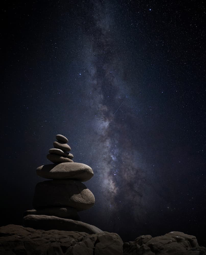 Milky Way Stone Balance by Margaret Halaby — canvas wall art