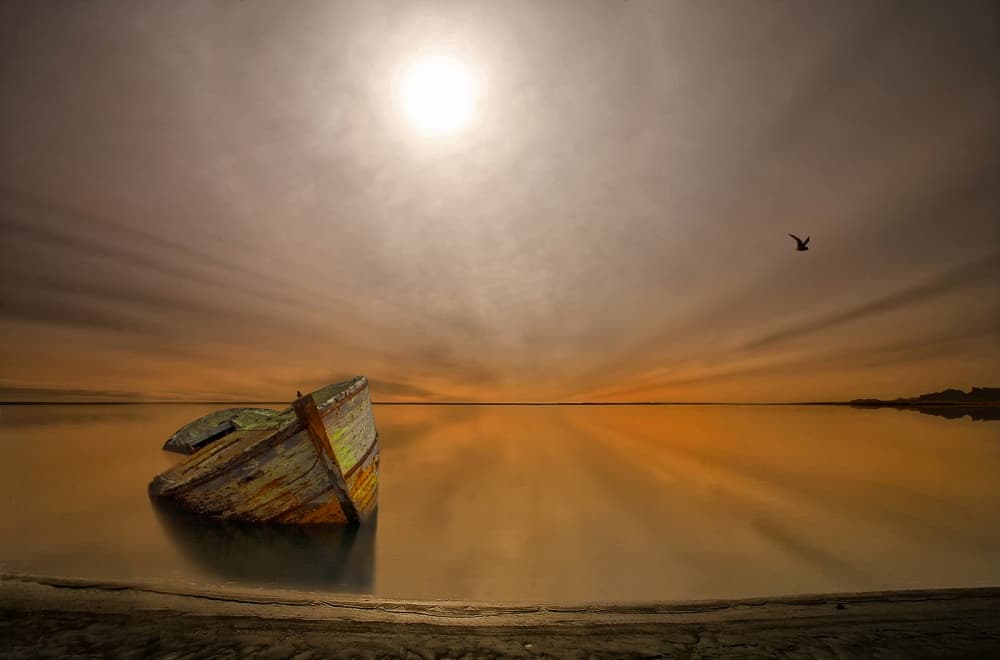 Golden Hour Lone Boat by Þorsteinn H. Ingibergsson — canvas wall art