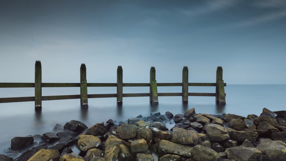 Tranquil Sea Fence by Ytje Veenstra — canvas wall art