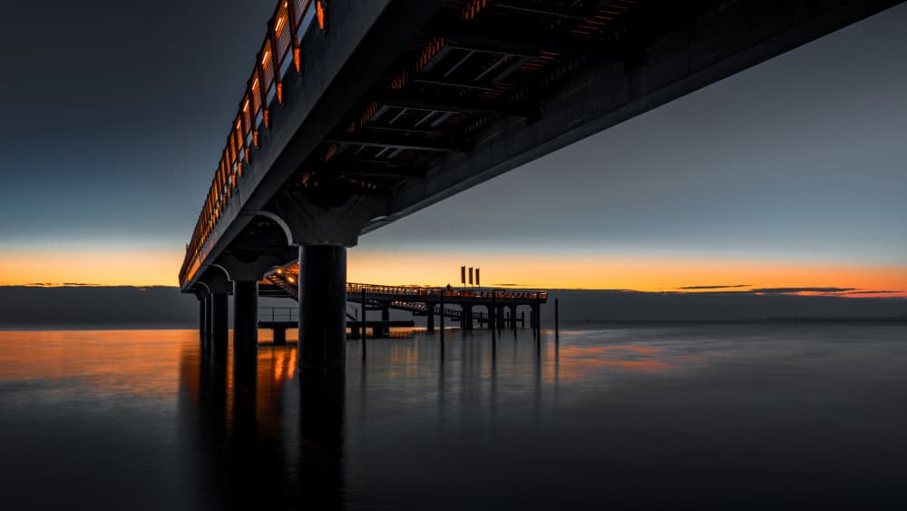 Coastal Pier Glow by Jürgen Muß — canvas wall art