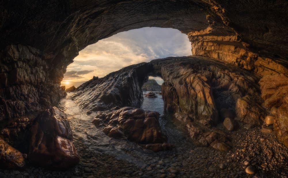 Sunset Sea Cave Arch by Carlos Gonzalez — canvas wall art