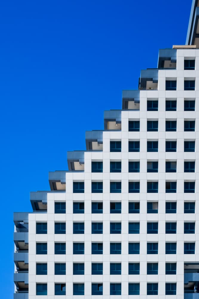 Stepped Building Blue Sky by Miroslaw Prybinski — canvas wall art
