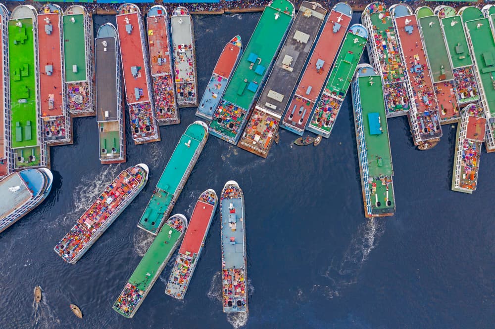 Crowded River Boats by Azim Khan Ronnie — canvas wall art