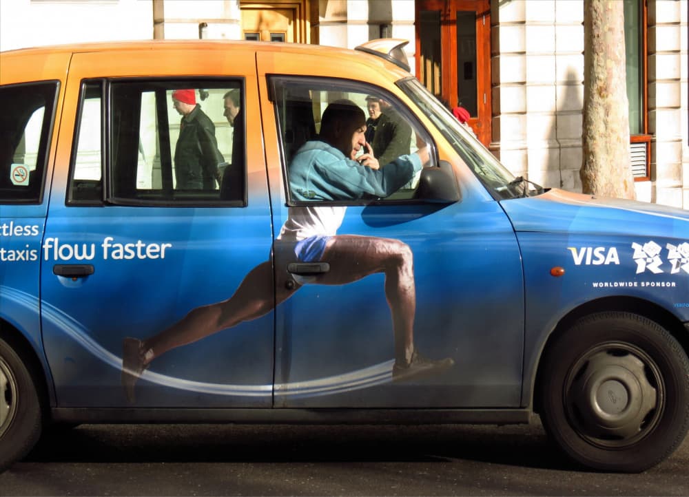 Running Man Taxi Ad by Aliza Riza — canvas wall art