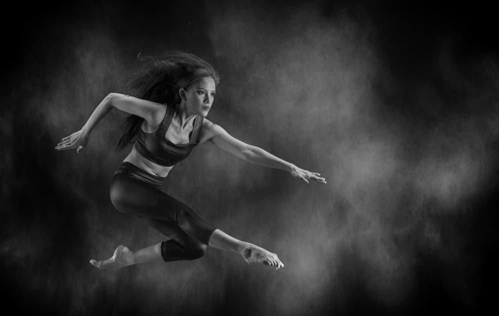 Dancer In Powder Cloud by Angela Muliani Hartojo — canvas wall art