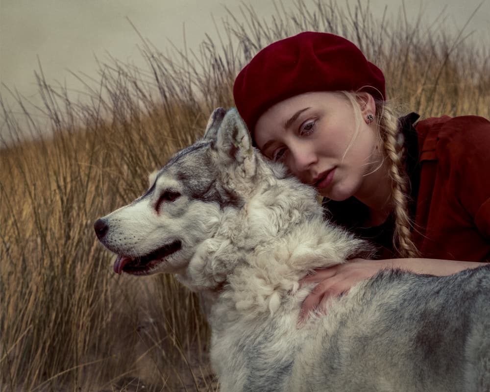 Woman Embracing Husky by Ineke Mighorst — canvas wall art