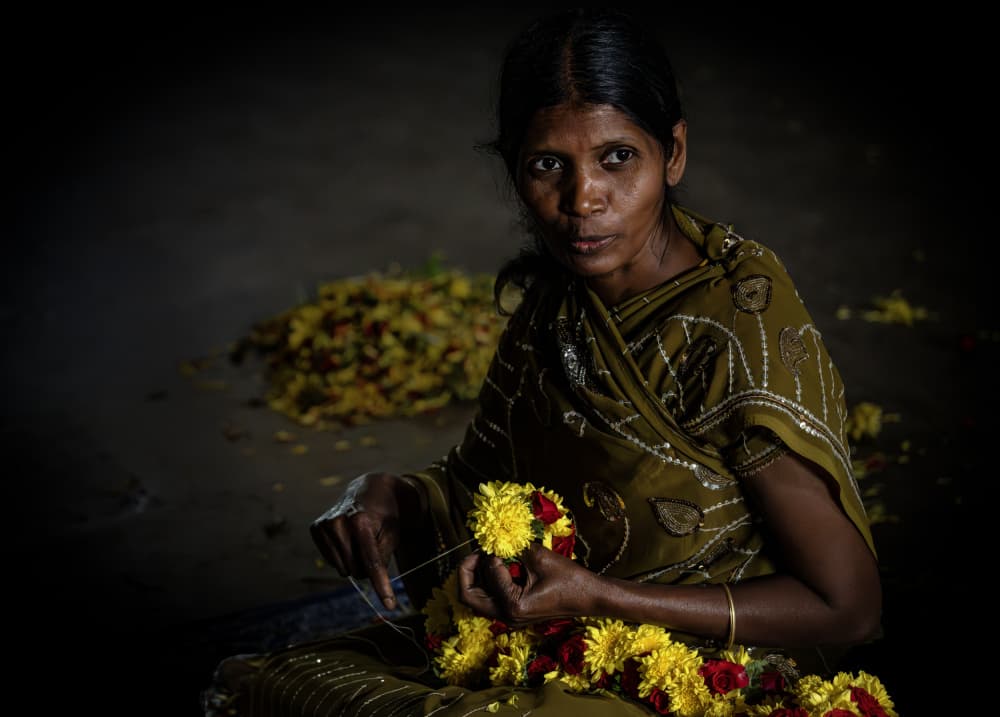 Indian Garland Weaver by Linda Wride — canvas wall art