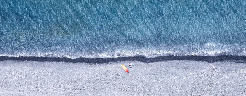 Pebble Beach Kayak Day by Peter Schaller — canvas wall art