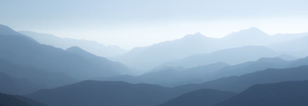 Misty Blue Mountains by Gemma Bardot — canvas wall art