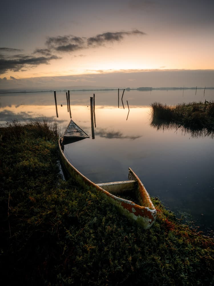 Sunken Boat Sunrise by Marco Faria — canvas wall art
