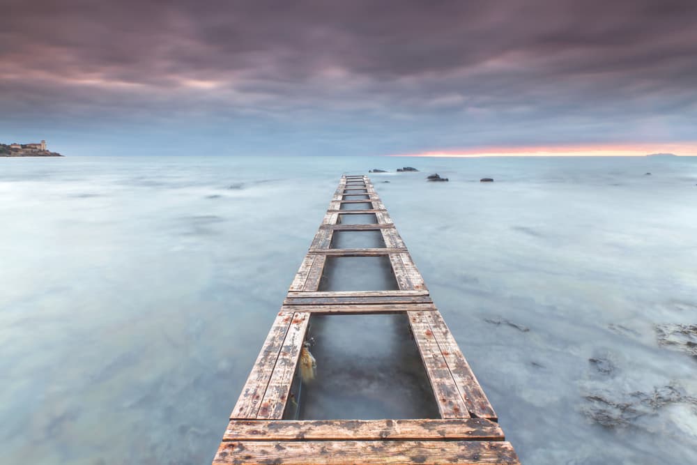 Tranquil Ocean Pier by Paolo Stoppani — canvas wall art