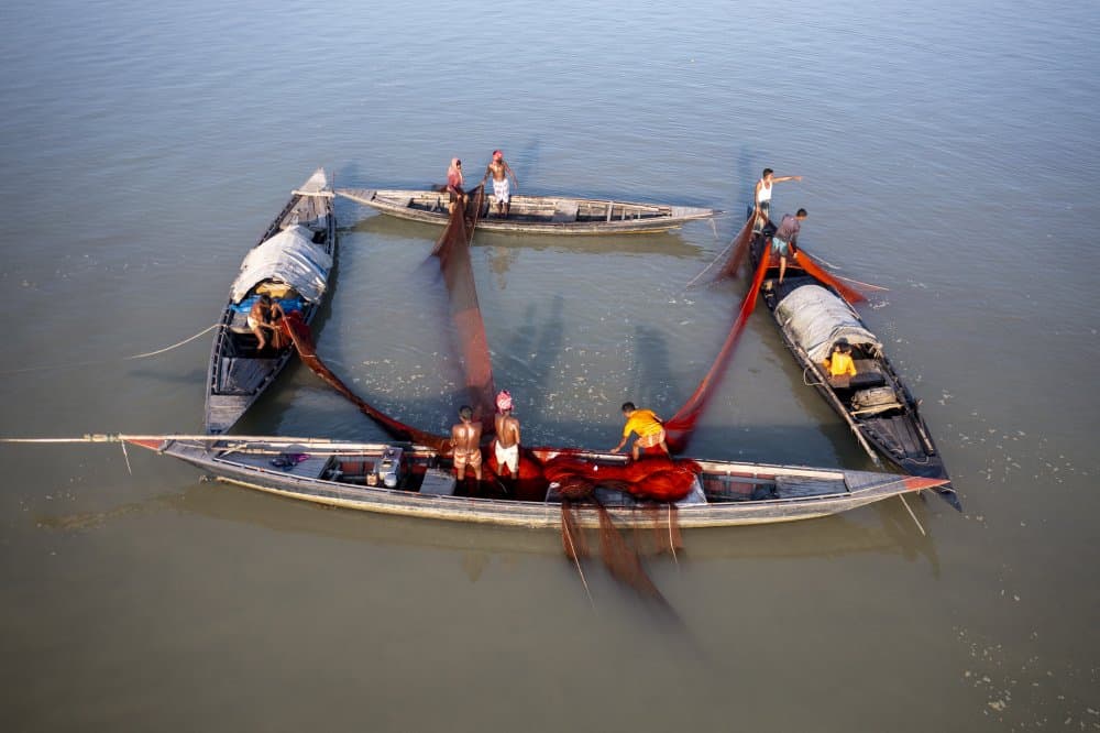 Fishermen Casting Nets by Azim Khan Ronnie — canvas wall art