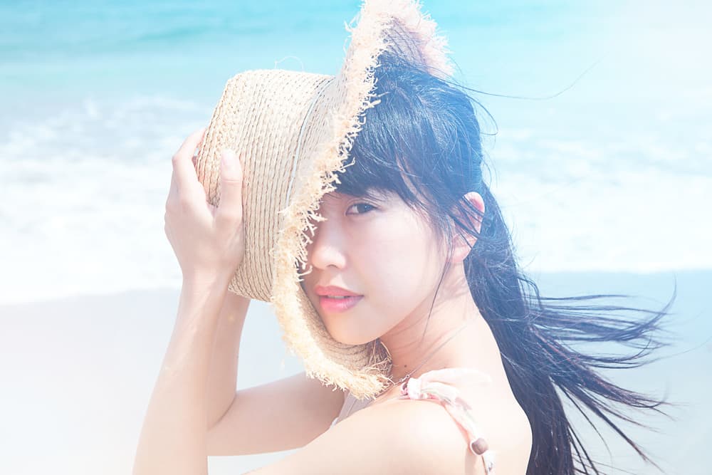 Sunny Beach Hat Portrait by 7 Flavor C/P — canvas wall art