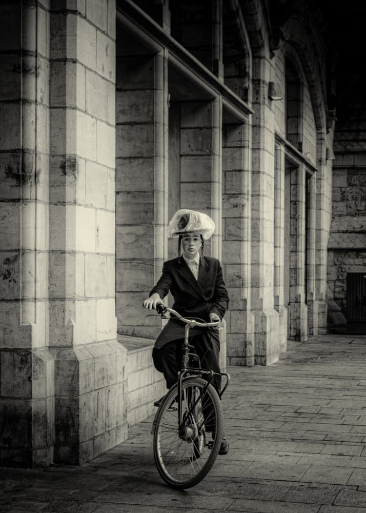 Mysterious Cyclist in Arcade by Rudy Mareel — canvas wall art