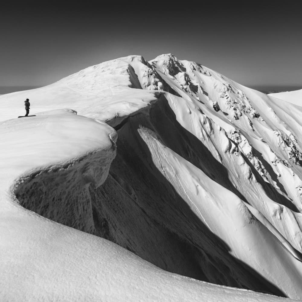 Solitary Figure Winter Ridge by Matej Rumansky — canvas wall art