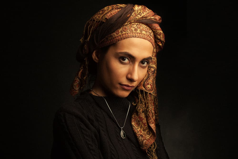 Pensive Woman In Scarf by Mehdi Mokhtari — canvas wall art