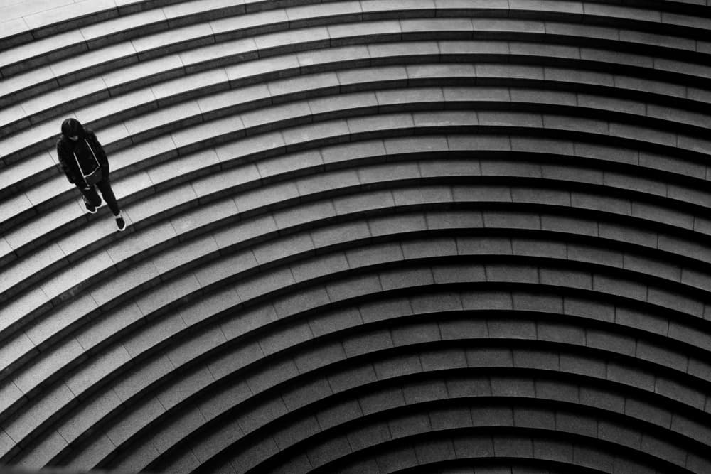 Lone Figure Curved Stairs by Reiko kiri — canvas wall art