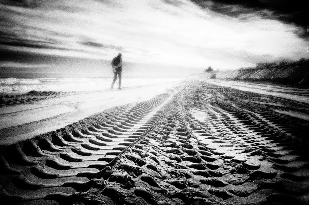 Solitary Beach Walk by Enrico Facchetti — canvas wall art