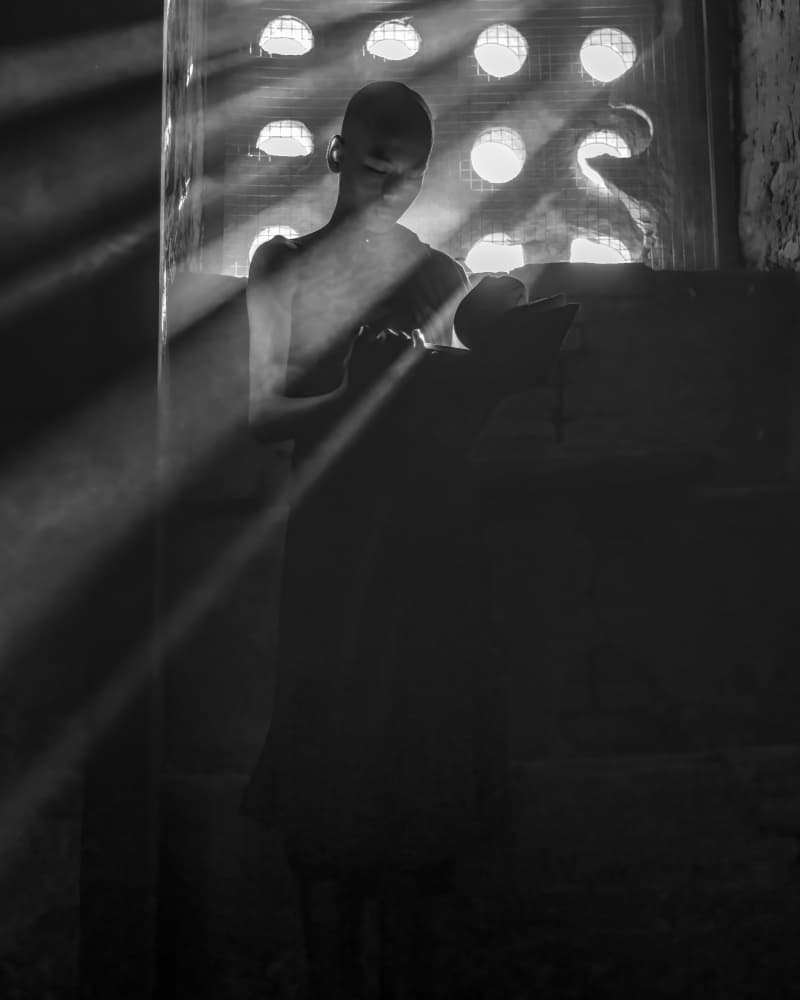 Monk in Sun Rays by Dev Sirikulthada — canvas wall art
